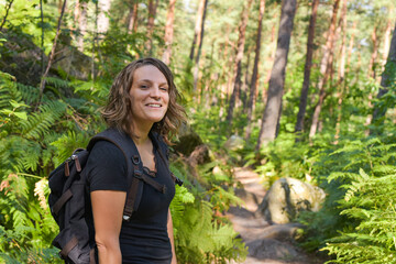 caucasian woman hiking in french forest