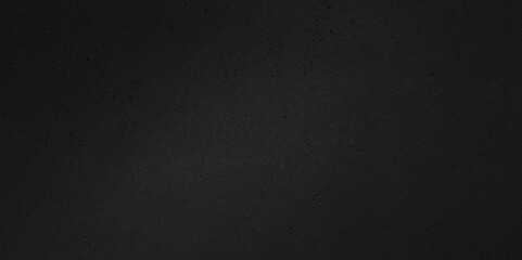 dotted dark black stone texture background. black natural porous stone texture, simple background wallpaper. abstract cement wall background and grunge texture.
