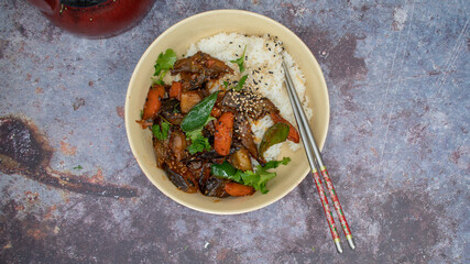 Korean eggplant and carrot fry over rice, plant based vegan bowl