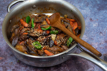 Korean eggpant and carrot fry in pan, copy space