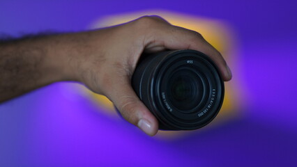 picture of a camera lens holding
