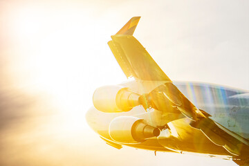 Sun rays lightening a Boeing 747 taking off