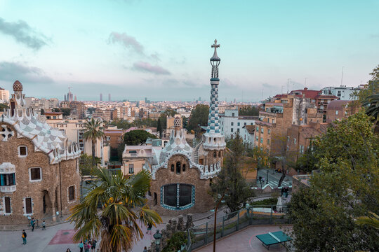 Barcelona, Spain - April 19 2022: Park Guell created by Antoni Gaudi. Beautiful colorful architecture with ceramic mosaic