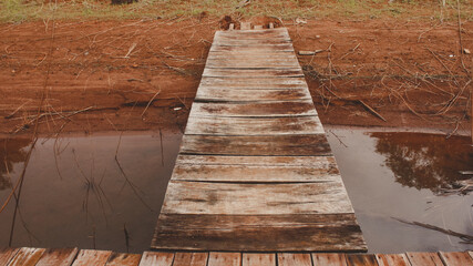 closeup wooden walkway on the water