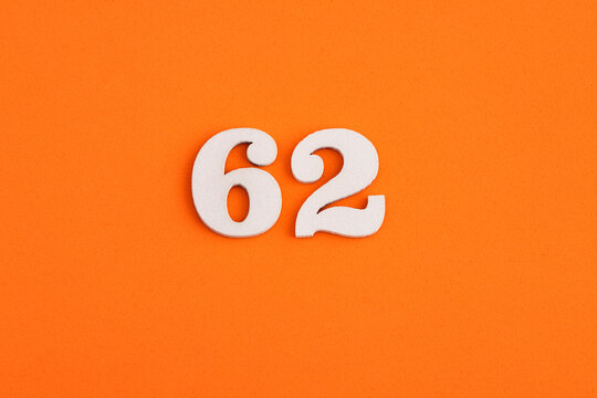 Number 62 - On orange foam rubber background