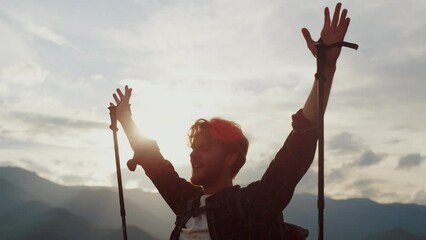 Tourist reach mountains peak close up. Happy guy celebrate victory success hike