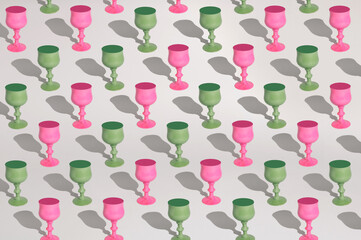 A creative pattern of wine vintage glasses on a white background. Beautiful shadows and caustics from sun. Concept summer or holidays light alcohol drinks.