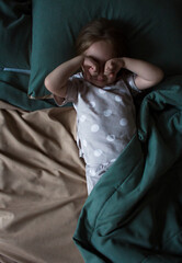 Obraz premium girl lying on the bed