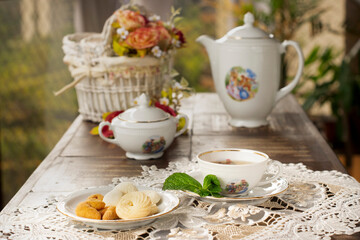 Vintage Porcelain Tea Sets including teapot, tea cup, plate, spoon, cookies and sugar pot. Mint tea.