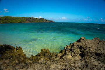 Fototapeta premium Maconde bay with pristine turquoise sea water, Mauritius island, Indian ocean