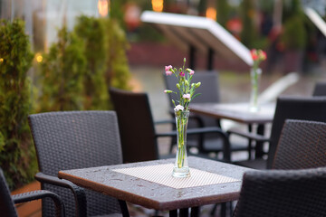 Table set in stylish outdoor cafe.