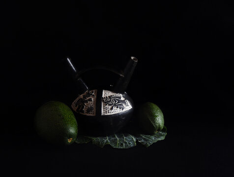 Still life native andean fruit, Avocado and Huaco.