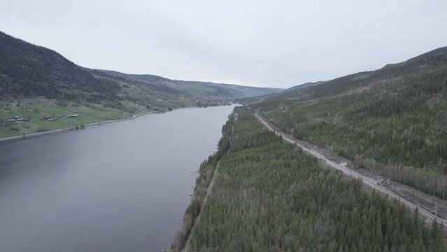 Aerial drone footage of a river on a cloudy day in Al, Hallingdal, Norway
