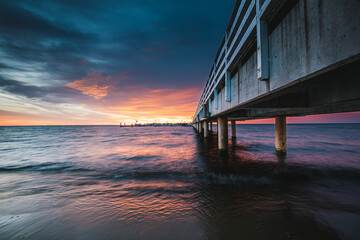 pier at sunset in Mechelinki - 521284144