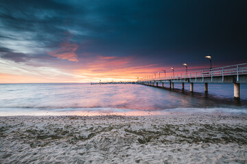 pier at sunset in Mechelinki - 521284145