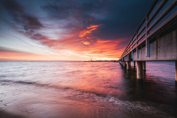 pier at sunset in Mechelinki - 521284146