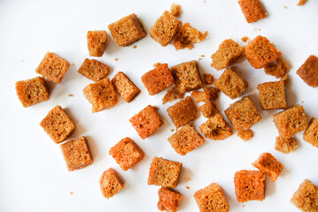Bread nuts with pepper and spices on a white background.
