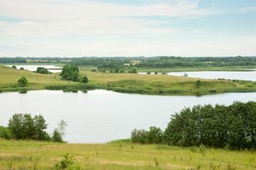 Fototapeta na wymiar Serene landscape with a lake