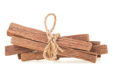 Sandalwood sticks tied with rope isolated on a white background