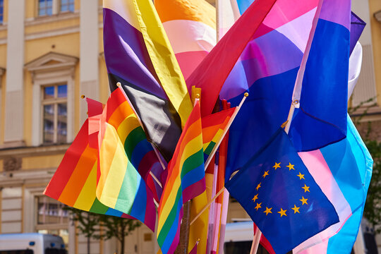 LGBTQ rainbow flags on pride parade. Tolerance, diversity and gender identity concept