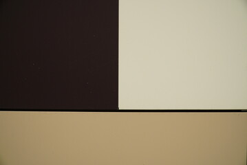 Texture of three-color metal siding on the wall