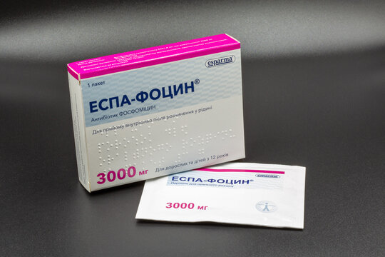 Espa-focyn fosfomycin antibiotic sachet by Esparma, Germany. Closeup on black.