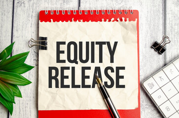 Equity Release words on white notepad and pen