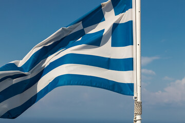 Greece flag seen in Santorini, Oia, Greece.