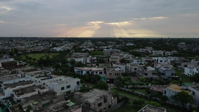 Dramatic clouds after rain during sunset over an urban area of Lahore in Pakistan's Punjab province. 