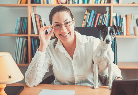 Woman and her dog in the office