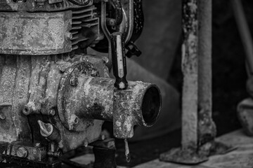 close-up detail of tools. Alicante in black and white. screwdriver between a machine.