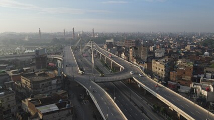 Fototapeta premium An aerial image of the Aazadi Chowk Interchange, located near the old city which includes historical landmarks of Lahore Fort and the famous Badshahi Mosque.