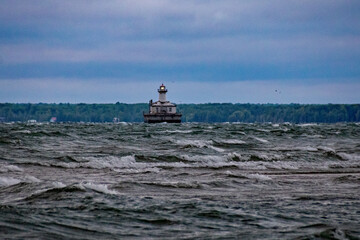 a lighthouse in the water