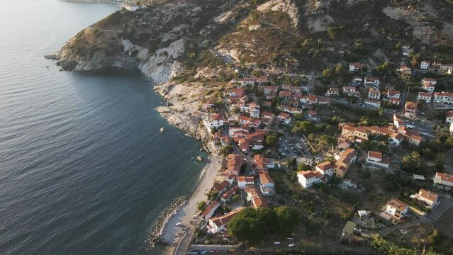 Aerial view of Pomonte, a small town along the coast facing the Mediterranean Sea, Elba Island, Tuscany, Italy.