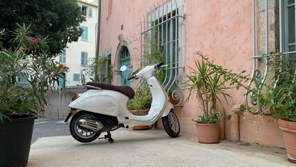 scooter parked on a street © AURELIO POLONI