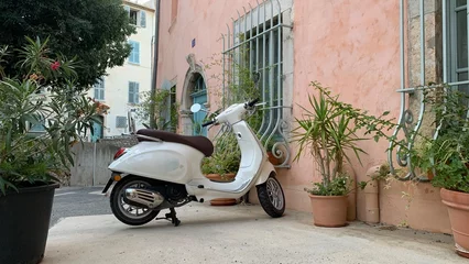 Poster scooter parked on a street © AURELIO POLONI