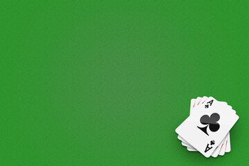Stack of four aces cards in corner on the green background