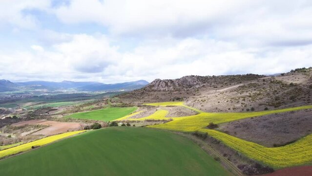 aerial landscape view of the green fields of the basque country, spain