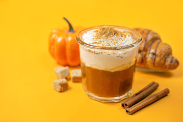 Pumpkin spiced Latte Coffee with whipped cream in a glass