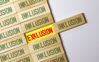 Cubes, dice or blocks with the german words for inclusion and exclusion - inklusion exklusion on...