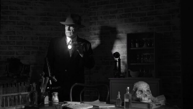 1940s film noir man in a creepy vintage laboratory using a flashlight to see what is there
