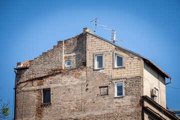 Selective blur on a building in belgrade, with an illegal building addition, with the construction of several additional floors and stories above the roof made without the approval of the urbanism law