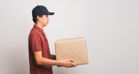 Asian man uniform holding package parcel box isolated on white background, Delivery courier and shipping service concept