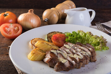 Grilled pork chops recipe at restaurant.