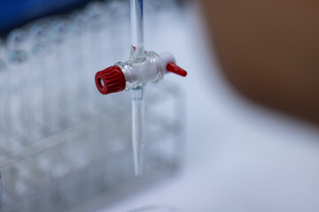 Scientist working Titration technique in the laboratory.
