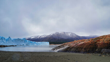 Rare and distinct ground-level view of the Perito Moreno Glacier on a cloudy day