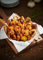  Fried calamari and shrimp. deep fried seafood (shrimps and squid). Selective focus.