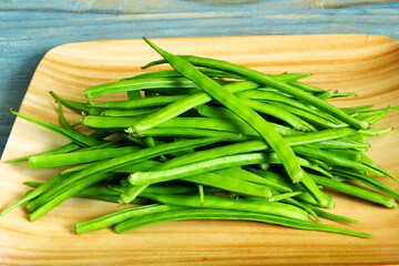  garden fresh indian vegetable green cluster beans or guar beans in dish also known in india as...