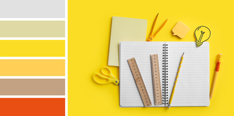 Set of stationery and drawn light bulb on yellow background. Different color patterns