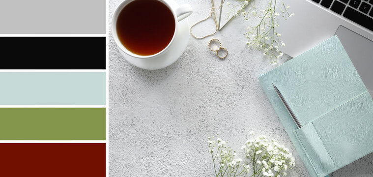 Stylish notebook with jewelry, gypsophila flowers, cup of tea and laptop on light background. Different color patterns